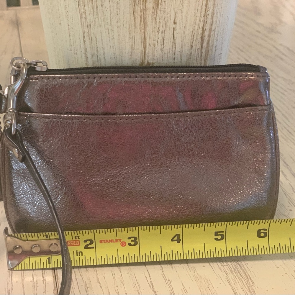Coach wristlet bronze/Gold metallic leather 6.5x4”like new condition